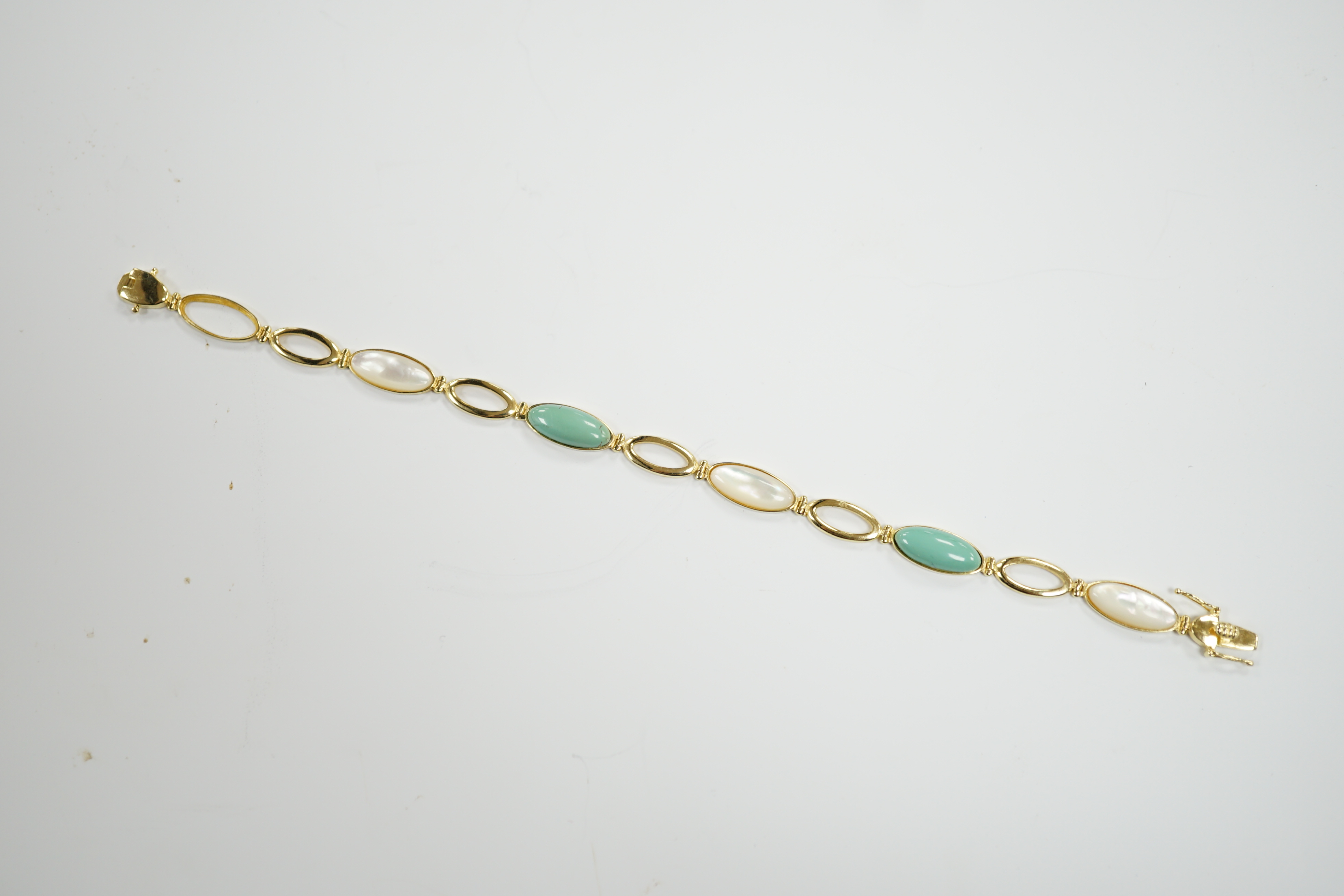 A modern 14k, mother of pearl and turquoise set bracelet, 18cm, gross weight 6.2 grams. moonstone and 14k bracelet